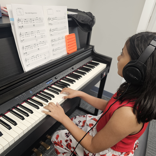 flexible girl playing piano